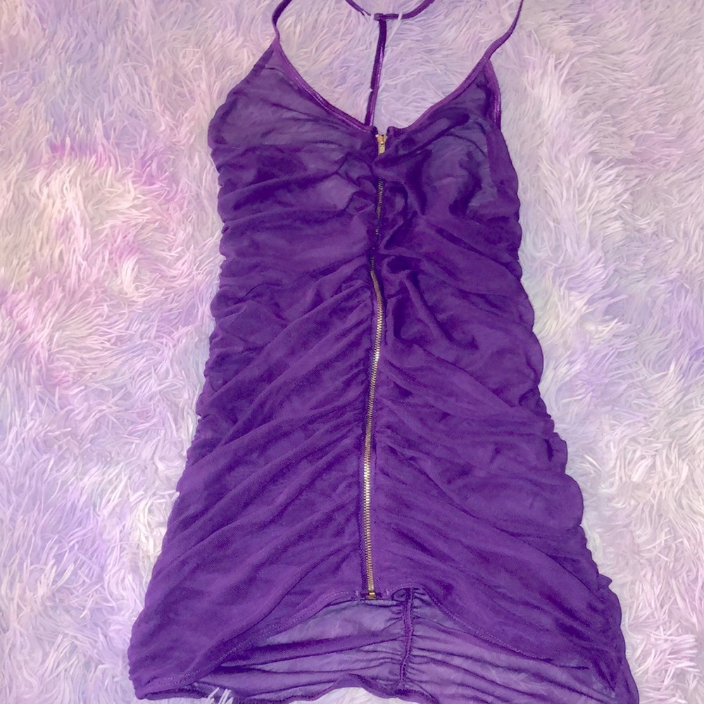 Purple zipper dress. Zips all the way down and open. Kinda see through. OS